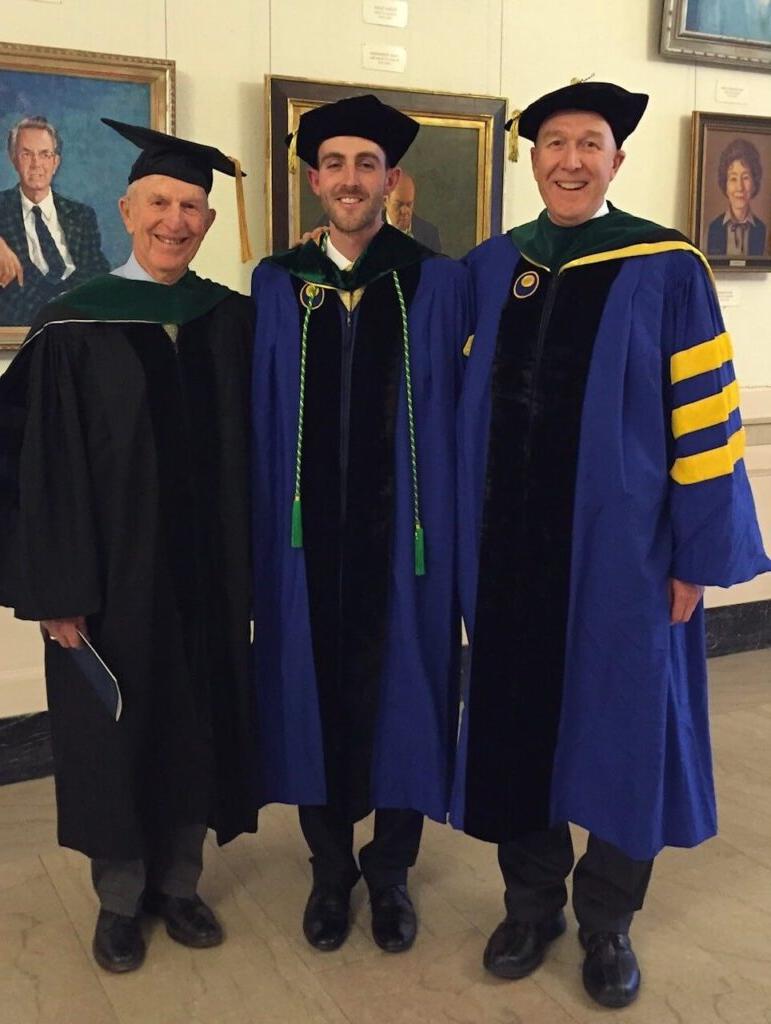 Kevin J. Geary poses with his nephew, Michael Geary, and his father, Joseph Geary, at Michael’s graduation from SMD. 